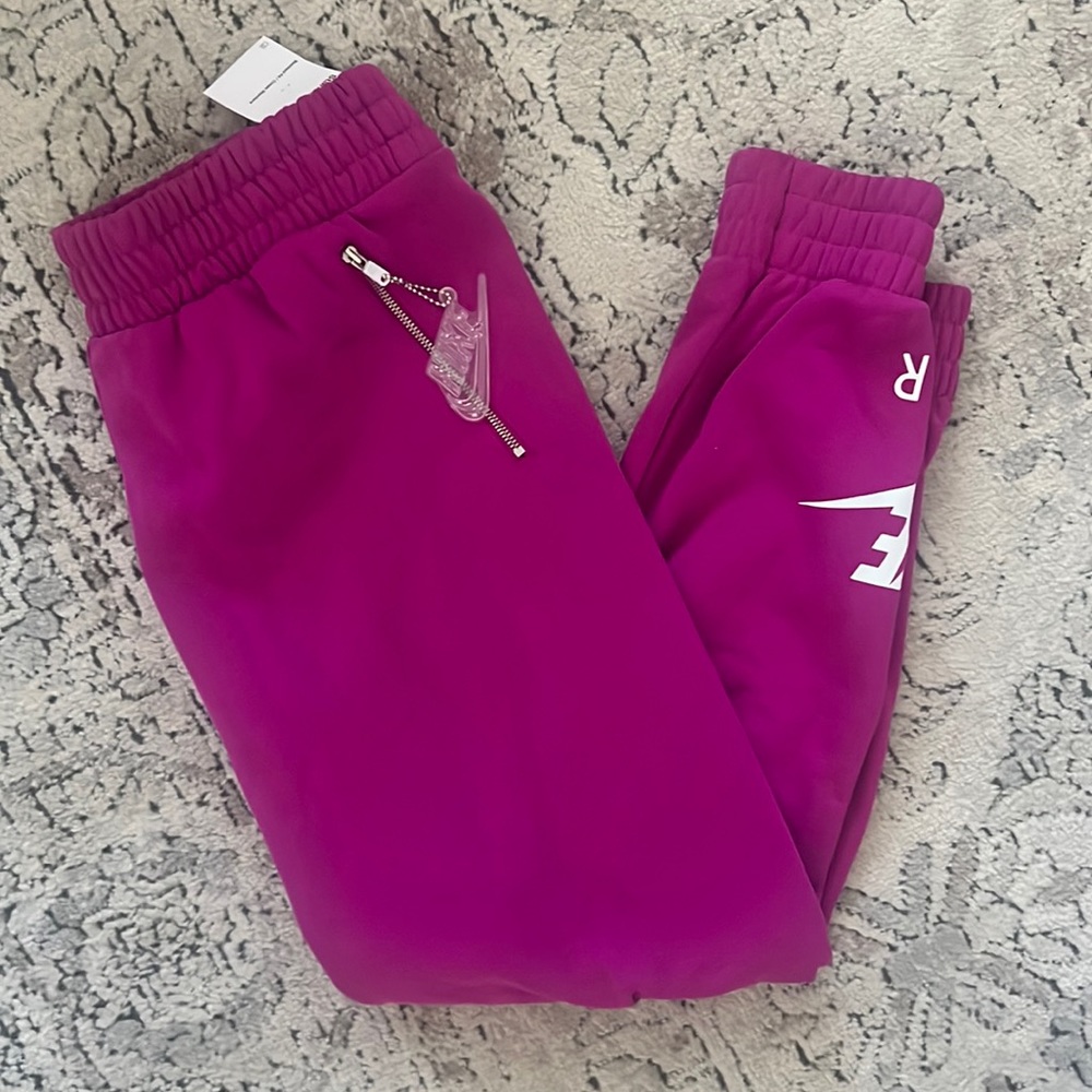 Brand New with Tags! Pink Nike Joggers size Medium